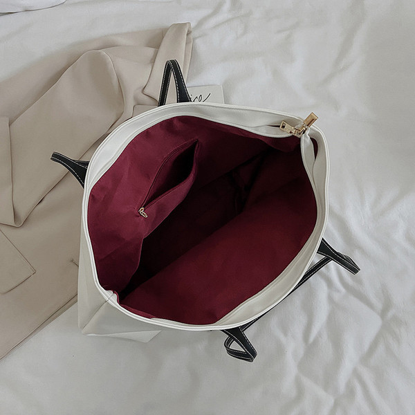 Mindennapi női bőr válltáska felirattal