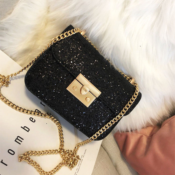 Modern női táska hosszú füllel, fényes hatással