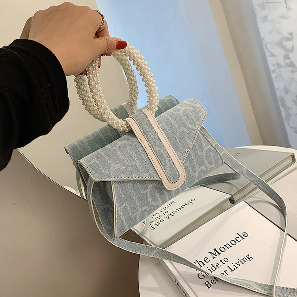 Moderna sieviešu soma ar apaļu rokturi un pērlēm