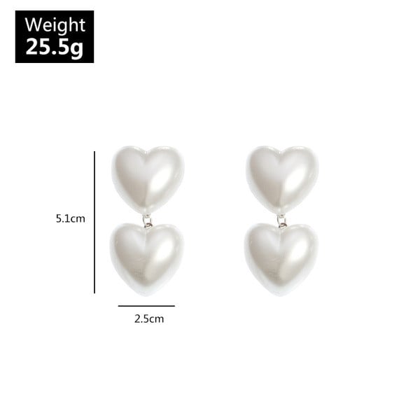 Südamekujulised pärlitest kõrvarõngad