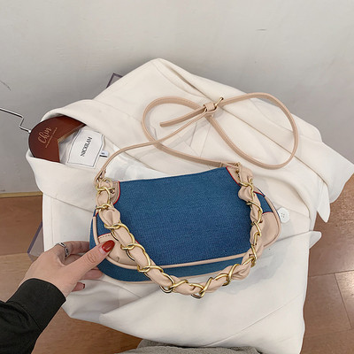 Modern női válltáska eko bőrből, fém elemekkel