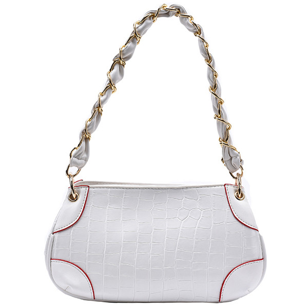 Modern női válltáska eko bőrből, fém elemekkel