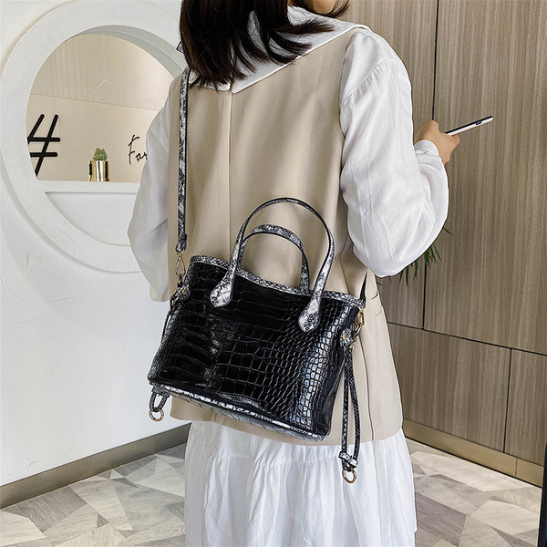 Kaasaegne ökonahast kott lühikeste ja pikkade sangadega