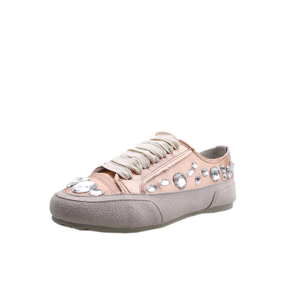 Modernas sieviešu kedas ar akmeņiem un saitēm