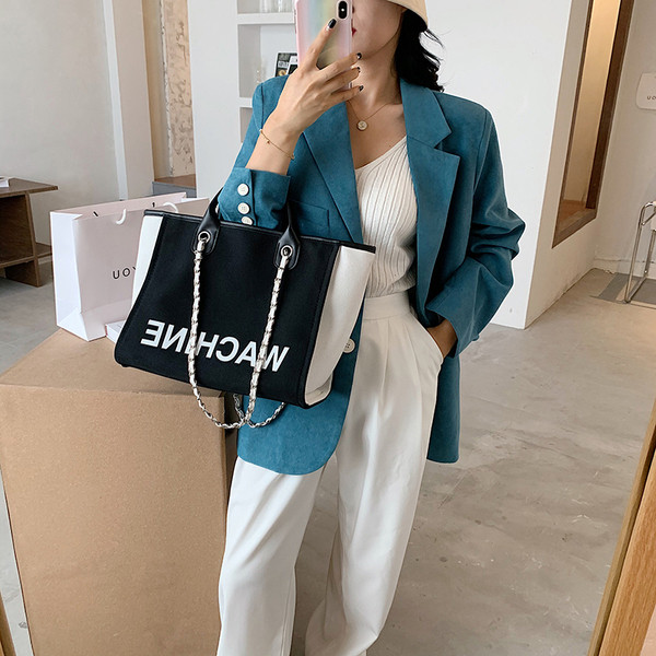 Geanta de dama zilnica cu inscriptie si manere scurte