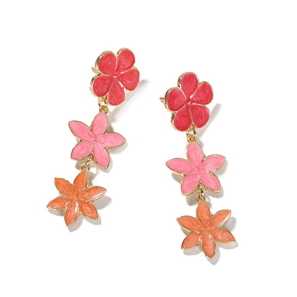 Lógó női fülbevaló virággal