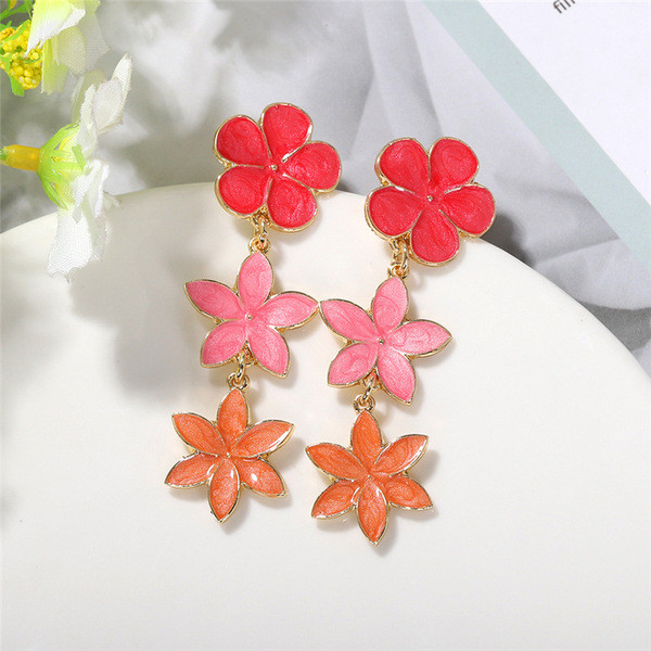 Lógó női fülbevaló virággal