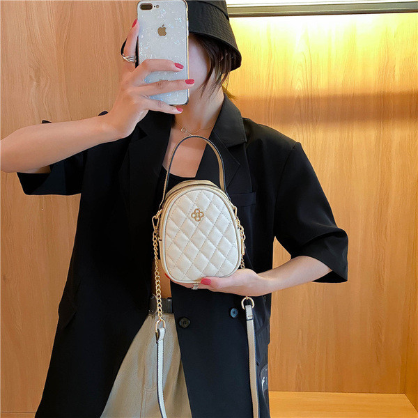 Naiste ajakohane pika sangaga käekott