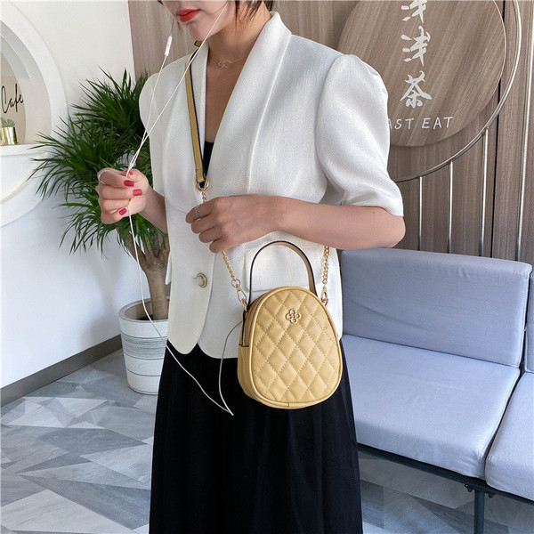 Naiste ajakohane pika sangaga käekott