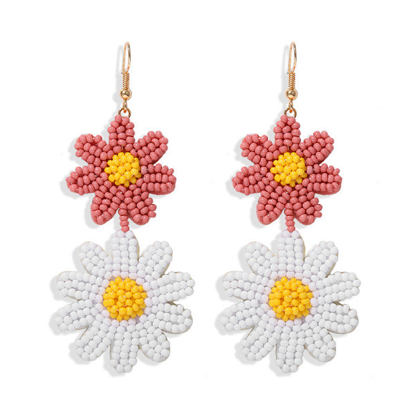 Karājoši sieviešu auskari ar divām pērlītēm