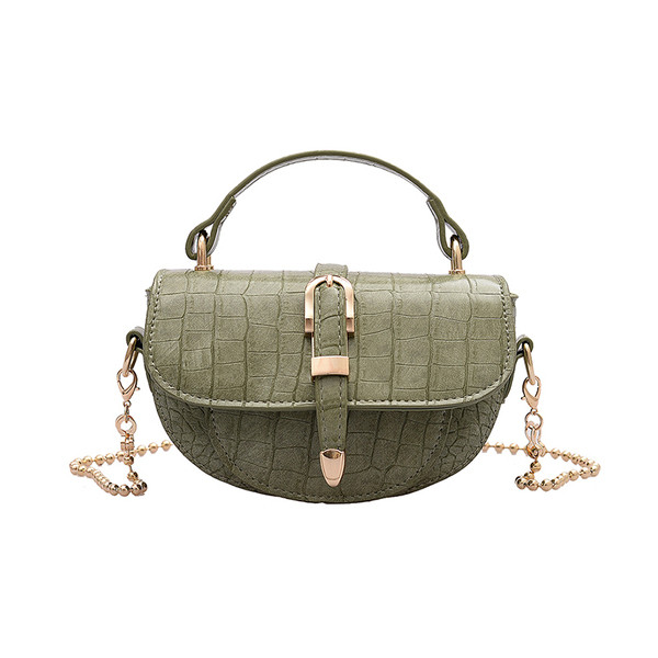 Stílusos női kisméretű műbőr táska fém elemekkel