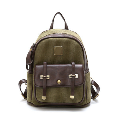 Korszerű női hátizsák elülső zsebbel és rövid fogantyúval