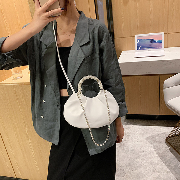 Stiilne naiste väike kott lühikese sanga ja dekoratiivpärlitega