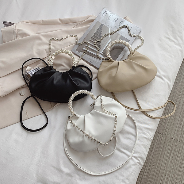 Stiilne naiste väike kott lühikese sanga ja dekoratiivpärlitega