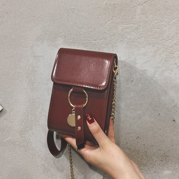 Mini geanta de dama eleganta din piele ecologica cu elemente metalice