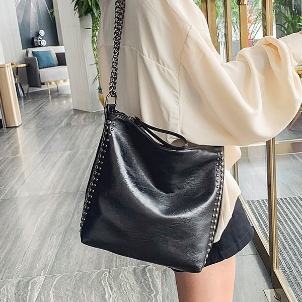 Naiste vabaajakott ökonahast lai mudel metallelementidega