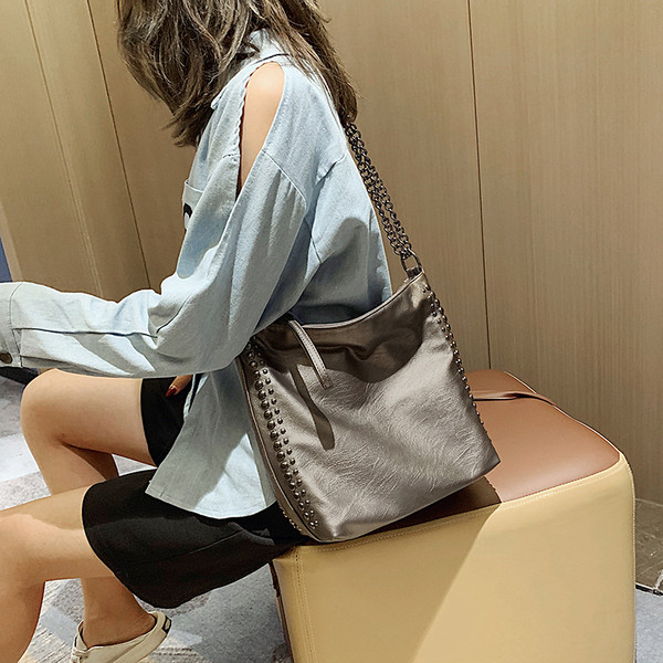 Naiste vabaajakott ökonahast lai mudel metallelementidega