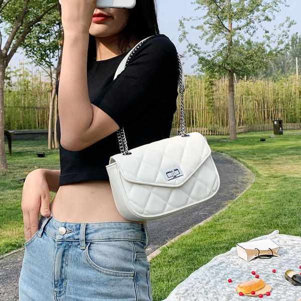 Stiilne pika sanga ja lukuga naistekott