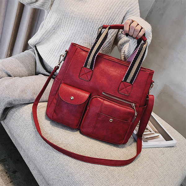 Naiste kaasaegne ökonahast taskutega kott