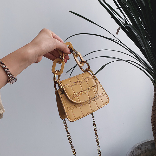 Öko bőrből készült modern női mini táska, hosszú fém fogantyúval