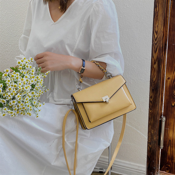 Sieviešu aktuāla soma kvadrāta formā ar īsu un garu rokturi