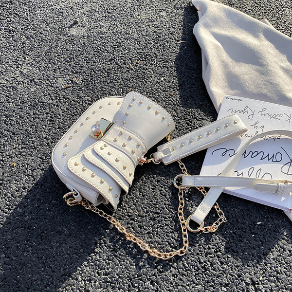 Női modern kis táska öko bőrből kövekkel