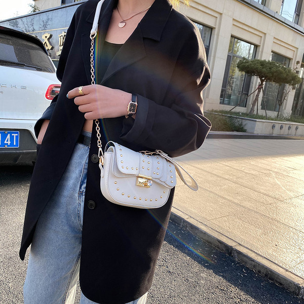 Női modern kis táska öko bőrből kövekkel