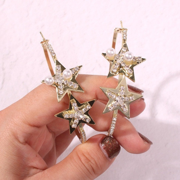 Zeltaini sieviešu apaļi auskari ar zvaigznēm