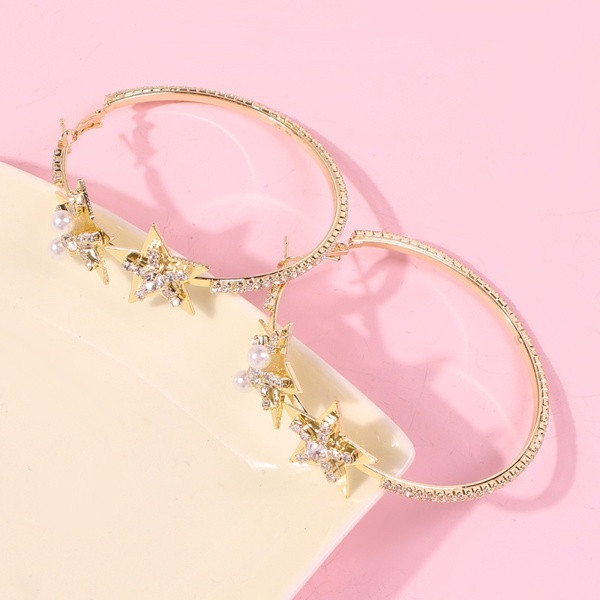 Zeltaini sieviešu apaļi auskari ar zvaigznēm