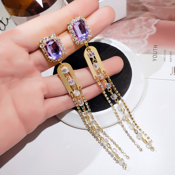 Elegantsed kivide ja metallelementidega naiste kõrvarõngad