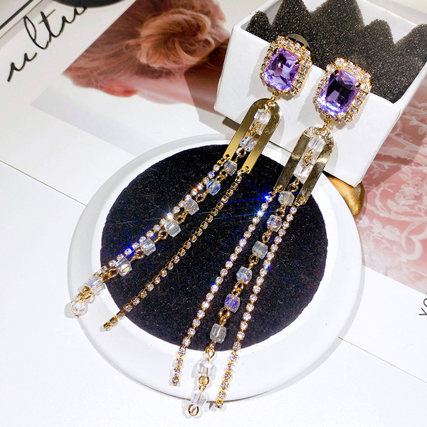 Elegantsed kivide ja metallelementidega naiste kõrvarõngad