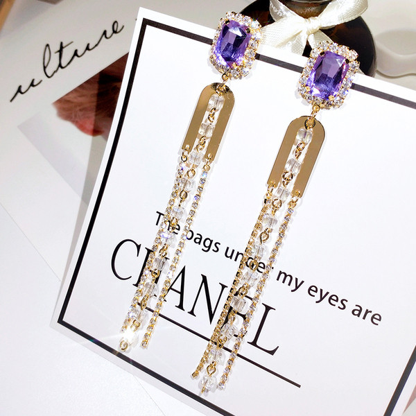 Elegantsed kivide ja metallelementidega naiste kõrvarõngad