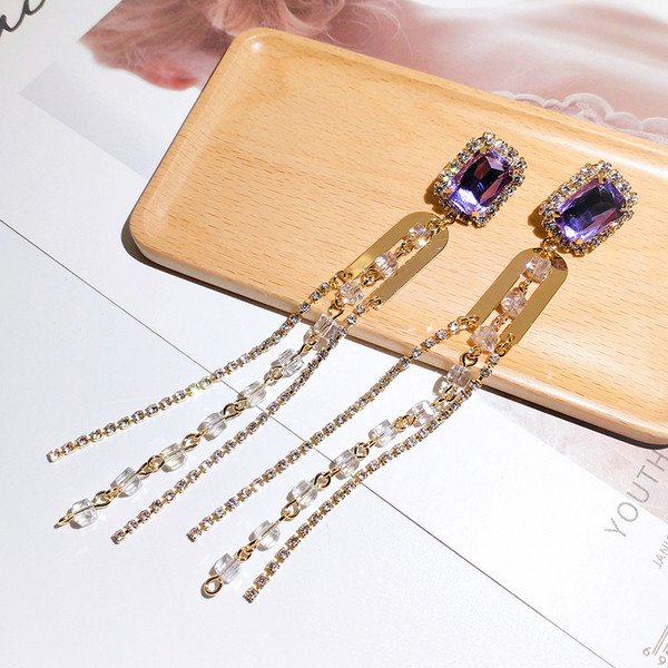 Elegantsed kivide ja metallelementidega naiste kõrvarõngad