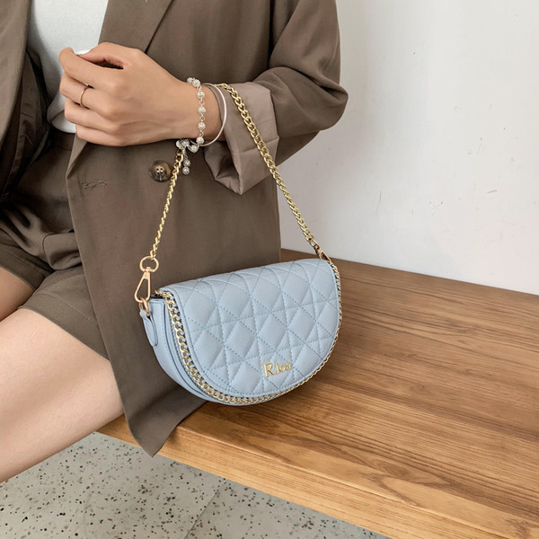 Sieviešu moderna eko-ādas soma ar garu metāla rokturi