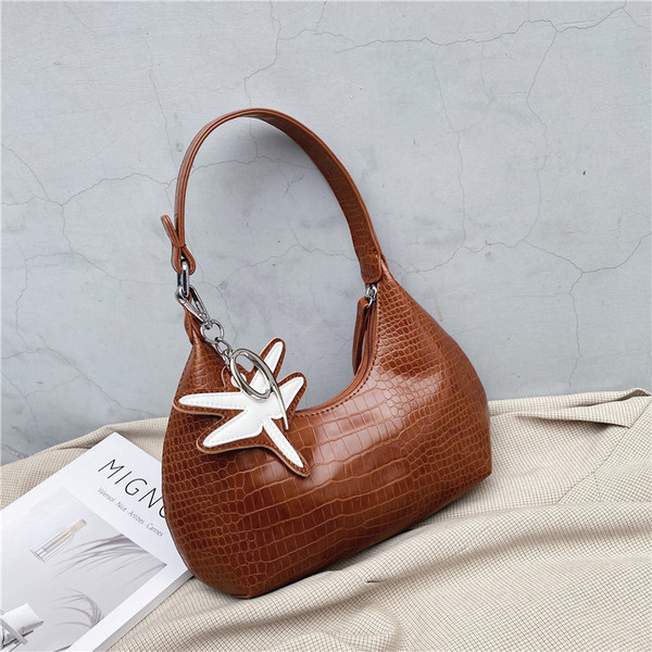 Geanta casual de dama in forma rotunda din piele ecologica