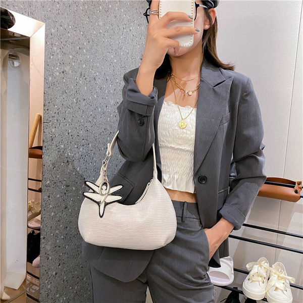 Geanta casual de dama in forma rotunda din piele ecologica