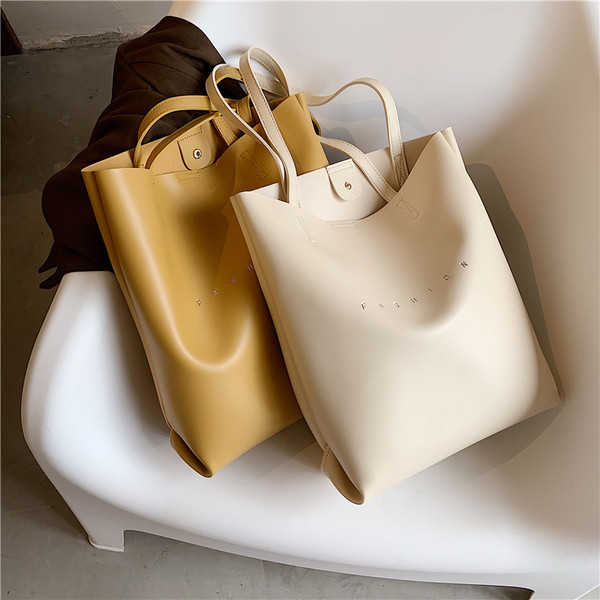 Ekobőr széles modellből készült alkalmi női táska