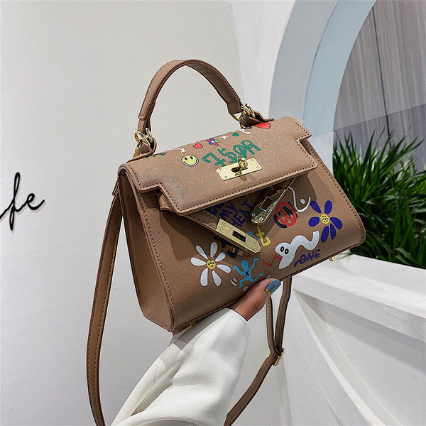 Geanta de dama moderna din piele ecologica cu aplicatii