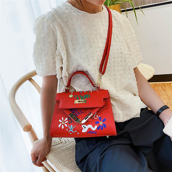 Geanta de dama moderna din piele ecologica cu aplicatii