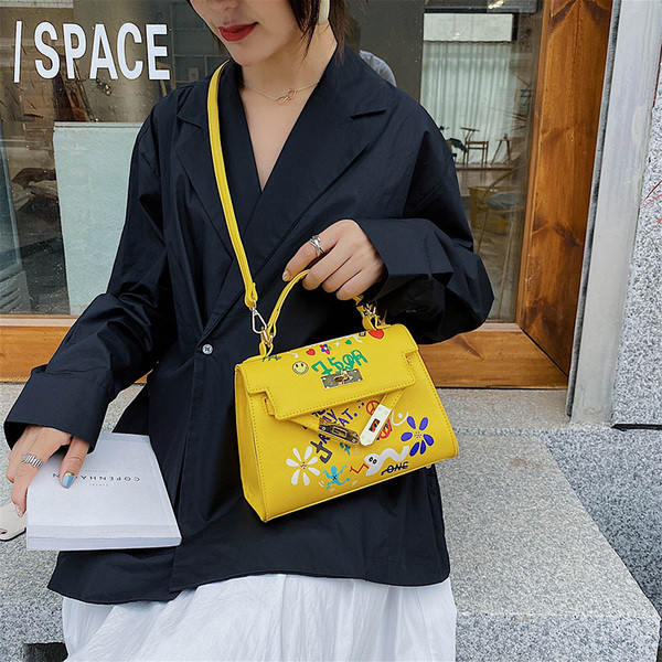 Geanta de dama moderna din piele ecologica cu aplicatii