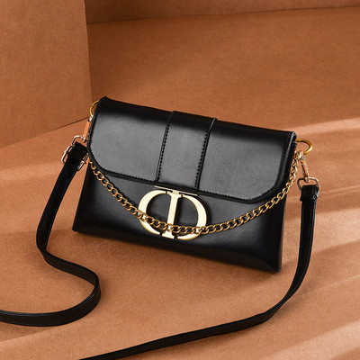 Öko-nahast valmistatud vabaaja naiste kott metallist elementide ja pika sangaga