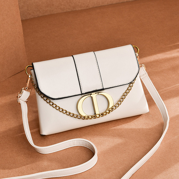 Öko-nahast valmistatud vabaaja naiste kott metallist elementide ja pika sangaga