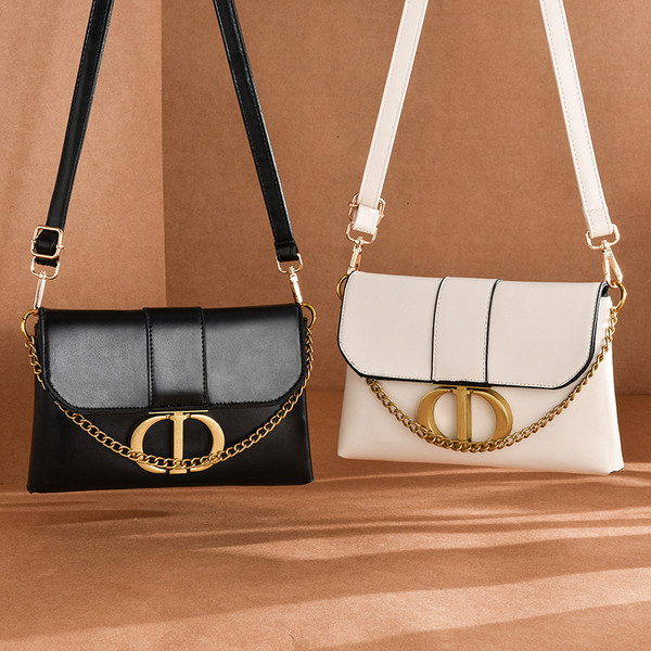 Öko-nahast valmistatud vabaaja naiste kott metallist elementide ja pika sangaga