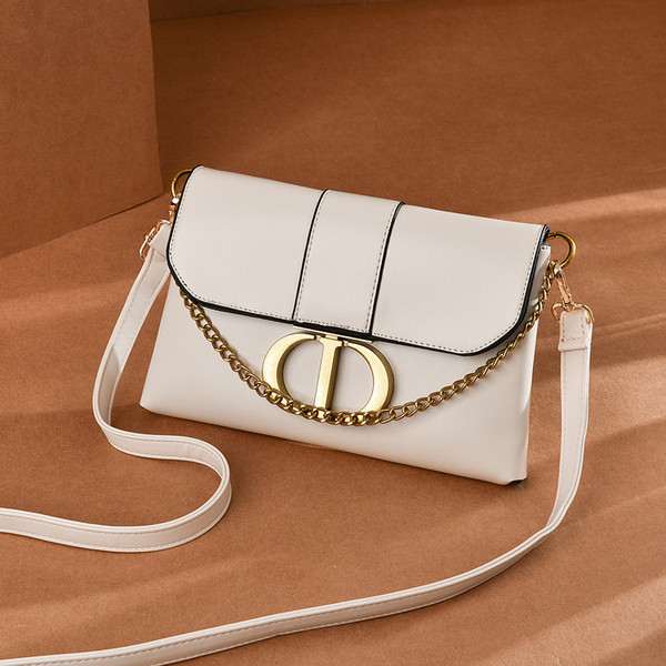 Öko-nahast valmistatud vabaaja naiste kott metallist elementide ja pika sangaga