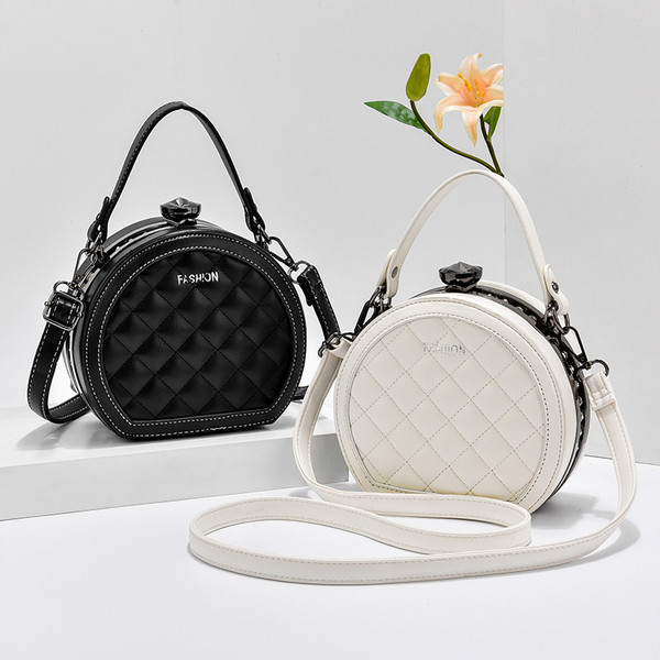 Öko-nahast ümmargune lühikese ja pika sangaga naistekott