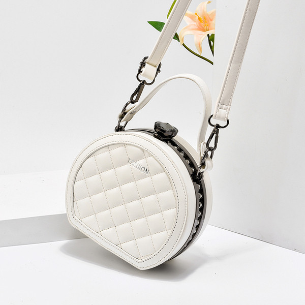 Öko-nahast ümmargune lühikese ja pika sangaga naistekott