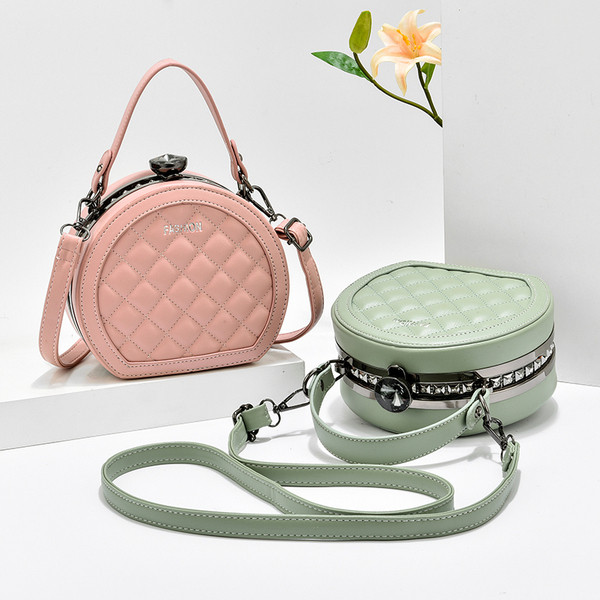 Öko-nahast ümmargune lühikese ja pika sangaga naistekott