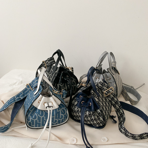 Női modern eco-bőr táska fűzővel