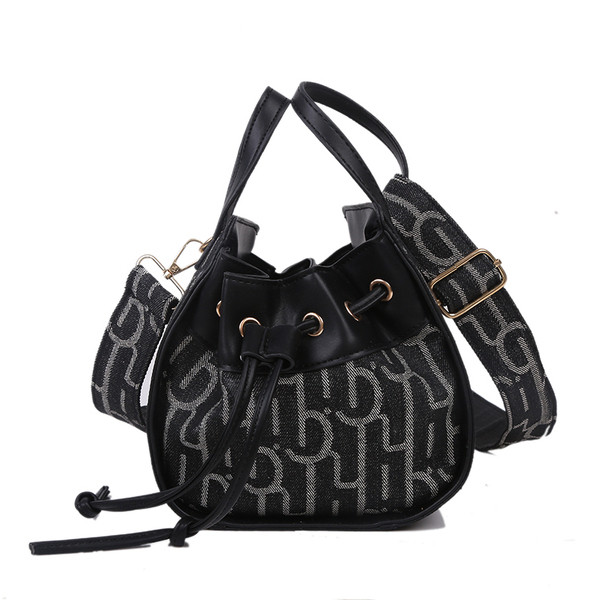 Női modern eco-bőr táska fűzővel