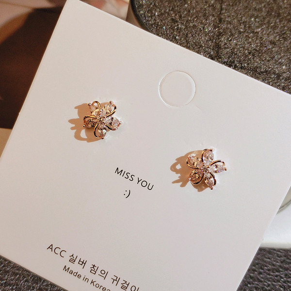 Lihtsad naiste kividega lillekujulised kõrvarõngad